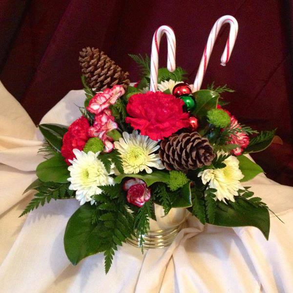 Compact fresh arrangement with candy canes